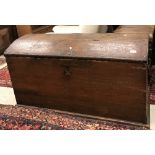 A 19th Century Continental oak dome dop trunk of slightly tapered form with iron carrying handles