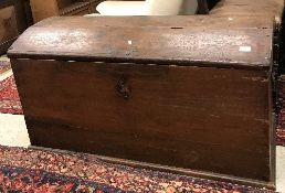 A 19th Century Continental oak dome dop trunk of slightly tapered form with iron carrying handles