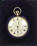 A silver pocket watch in a blue velvet box