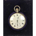 A silver pocket watch in a blue velvet box