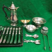 A collection of silver ware to include a Victorian silver hot water jug of small proportions