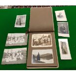 A collection of ephemera to include stamps, postcards, certificates,