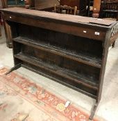 An oak two tier dresser plate rack of typical form