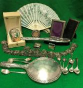 A box of silver and plated items to include a cased christening mug inscribed "Leon",