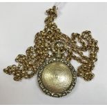 A Victorian 9 carat gold locket together with a 9 carat belcher chain weighing approx. 17.