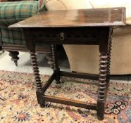 An oak single drawer side table in the 17th Century manner,