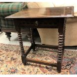 An oak single drawer side table in the 17th Century manner,