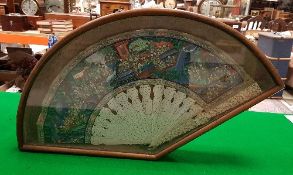 A Chinese ivory fan with hand-painted and ivory embellished panel of multi-figures in an interior