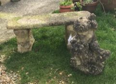 A concrete garden bench,