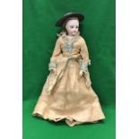 A late 19th Century French bisque headed fashionable doll in the manner of J Terrene (or possibly