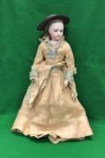 A late 19th Century French bisque headed fashionable doll in the manner of J Terrene (or possibly