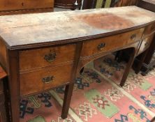 An early George III mahogany shallow bow fronted sideboard of slim proportions the central drawer