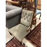 A Victorian walnut framed salon chair wi