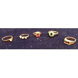 A collection of five gold stone set ring