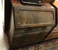 A mahogany bureau in the Georgian style