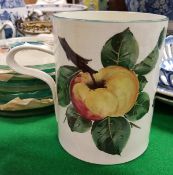 A Wemyss Pottery "Apple" decorated mug,