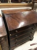 A 19th Century mahogany bureau, the fall