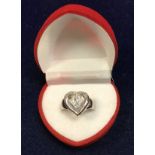 An 18 carat white gold dress ring set wi