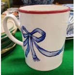 A Wemyss "Blue Bow" decorated quart mug