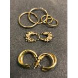 Four pairs of 9 carat gold hoop earrings