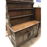 An Old Charm style oak dresser, the two