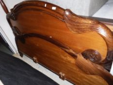 A modern oak and simulated rosewood fram