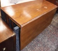 A 19th Century mahogany drop leaf dining