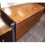 A 19th Century mahogany drop leaf dining