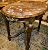 A French oval rosso marble topped table