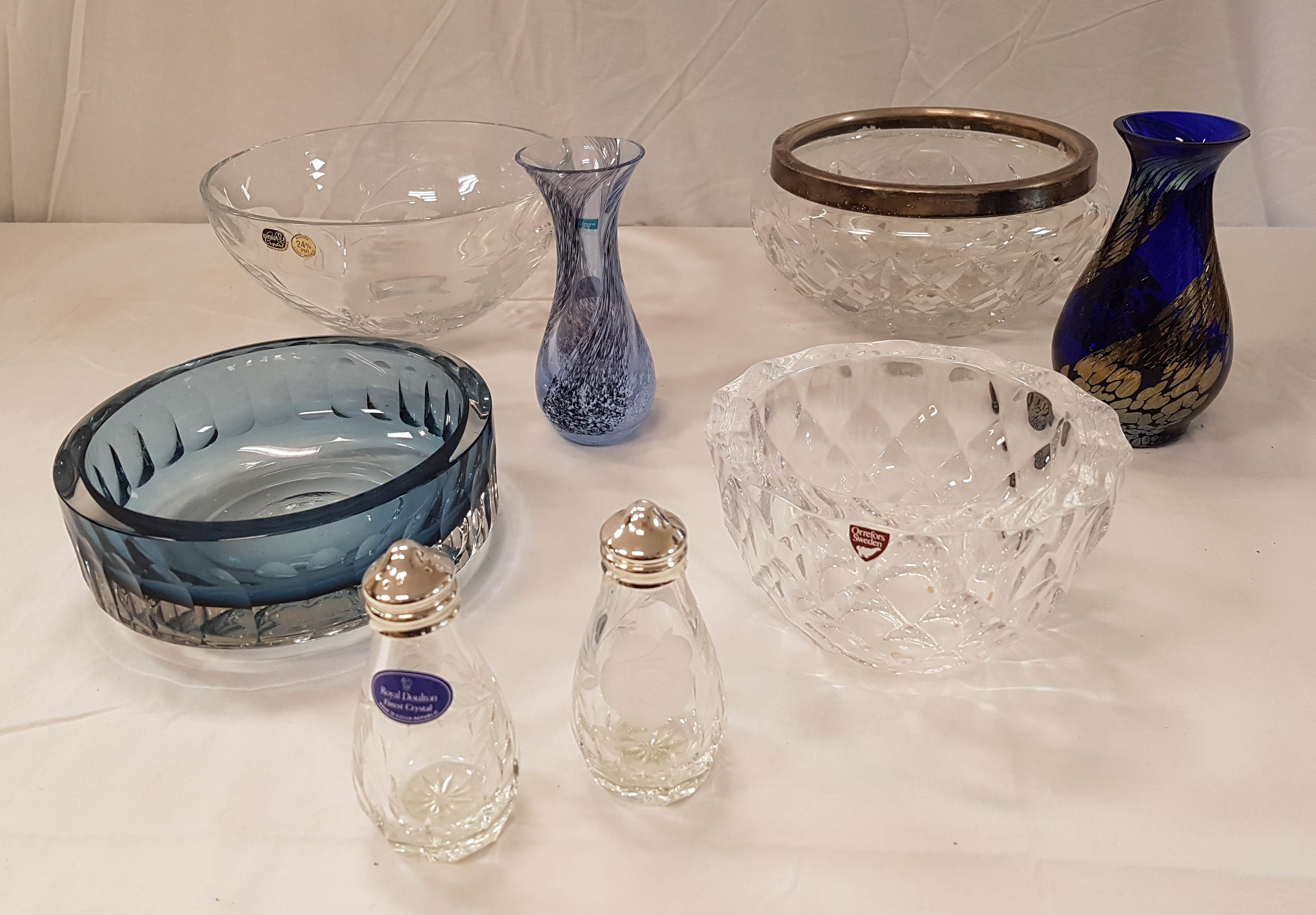 An Orrefors faceted glass bowl, together