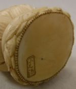 A 19th Century carved ivory okimono as a