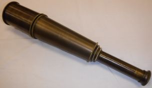 A modern reproduction brass four draw te