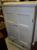 A childs white wood wardrobe with three quarter gallery top over two doors and one drawer size