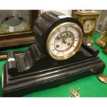 A late Victorian black marble cased mantel clock,