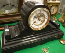 A late Victorian black marble cased mantel clock,
