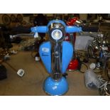A pale blue painted and polished metal "Vespa" table lamp