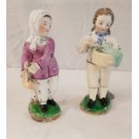 A pair of Derby type figures of fish sellers, she No'd to base 62, he indistinctly 61?,