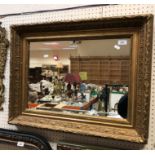 A giltwood and gesso framed wall mirror,