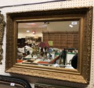 A giltwood and gesso framed wall mirror,