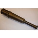 A modern reproduction brass four draw telescope inscribed "Broadhurst Clarkson & Co.