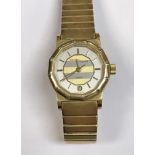 A Mougin & Piquard Ladies gold plated cased wristwatch with two colour dial and date aperture,