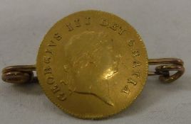 A George III gold half sovereign 1809,