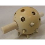 A 19th Century carved ivory spiked erotic pleasure ball, approx 6.