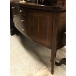 A Sheraton Revival mahogany and inlaid bow fronted sideboard with three drawers flanked by two