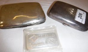 A Johnson Matthey silver ingot, 100g fine silver, together with two silver cigarette boxes,