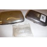 A Johnson Matthey silver ingot, 100g fine silver, together with two silver cigarette boxes,