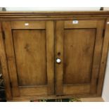 A late Victorian pine two door hanging cupboard Size approx 94cm long x 80cm high x 22cm deep