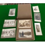 A collection of ephemera to include stamps, postcards, certificates,