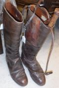 A pair of brown leather hunting boots CONDITION REPORTS Size not marked on boots but