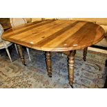 A pine and walnut D end dining table Size 158cm long x 72cm high x 128cm deep extended